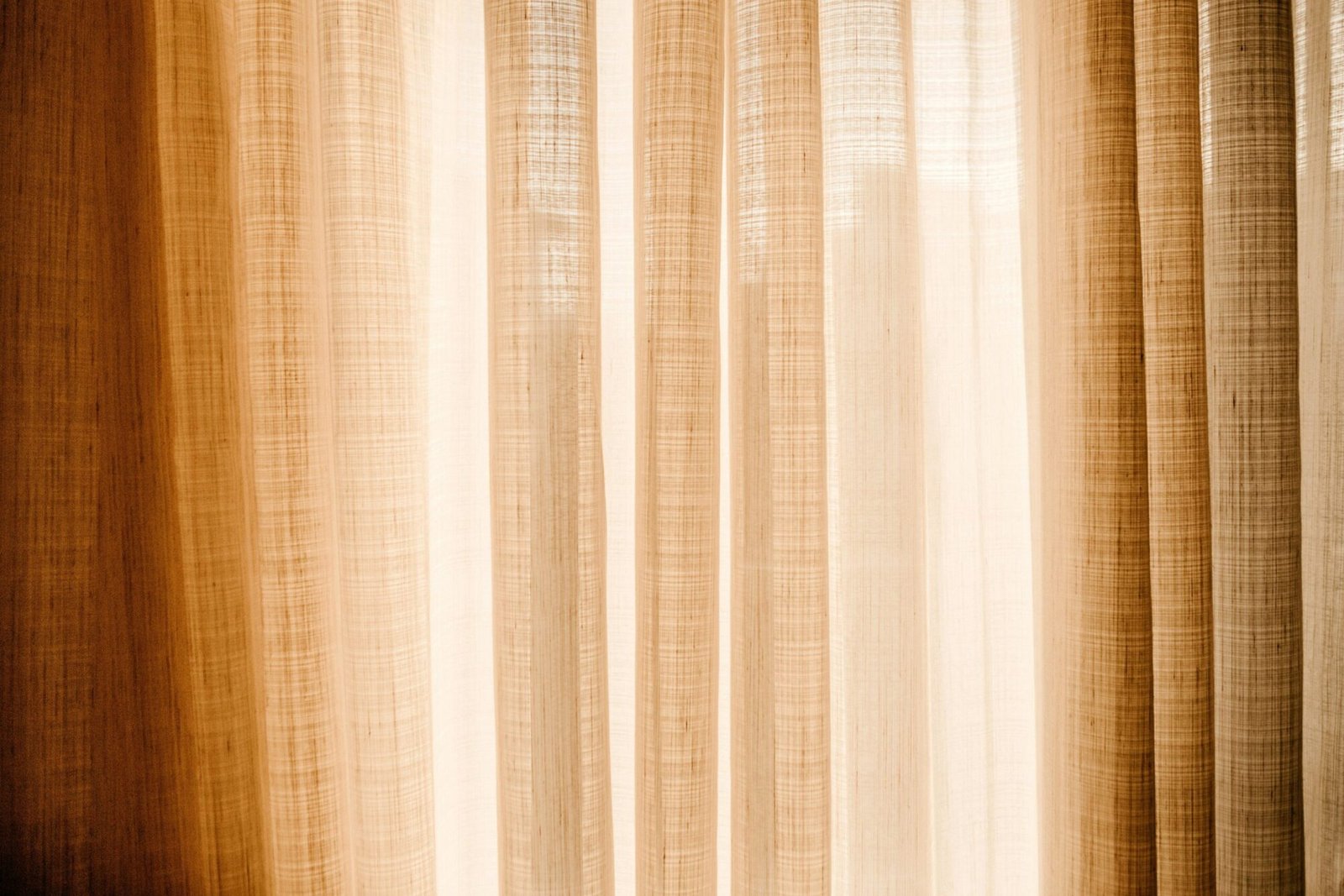 white and brown window curtain