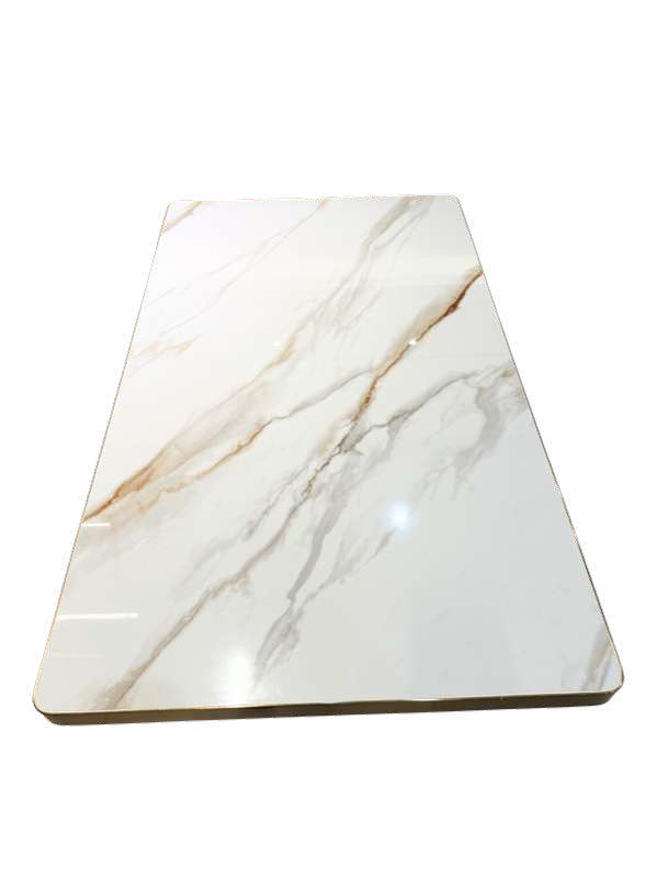Sobre de mesa piedra sinterizada blanco brillo con canto oro
